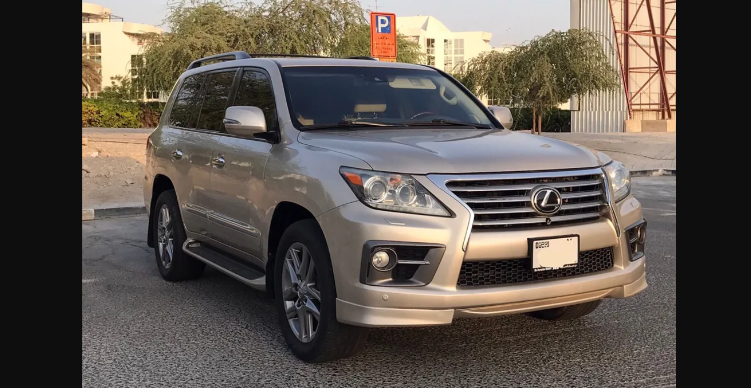 سيارة لكزس lx570 موديل 2012 ذهبي وبيج خليجي فول اوبشن من داخل ماشي 233 ألف 